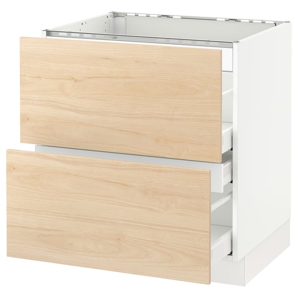 SEKTION kitchen cabinet with light ash drawers and white base, partial open.