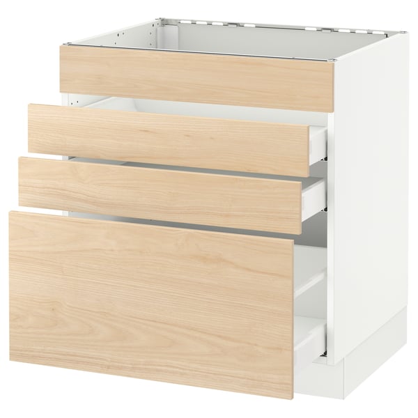 Light wood SEKTION kitchen cabinet with three open drawers, white frame, smooth-running drawer system.