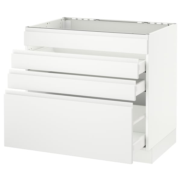 A white SEKTION kitchen cabinet with three drawers and a tempered glass top. The compact, rectangular design is sleek and modern.