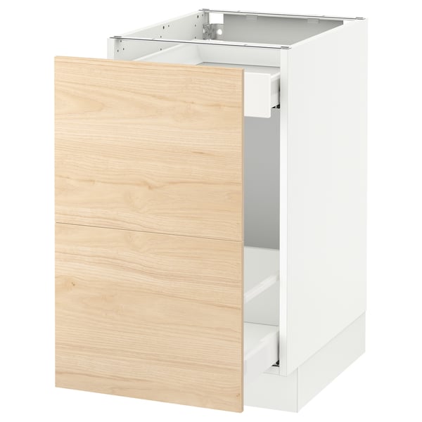 A white SEKTION kitchen cabinet with light ash wood drawers. It a sturdy frame with smooth-running drawers.