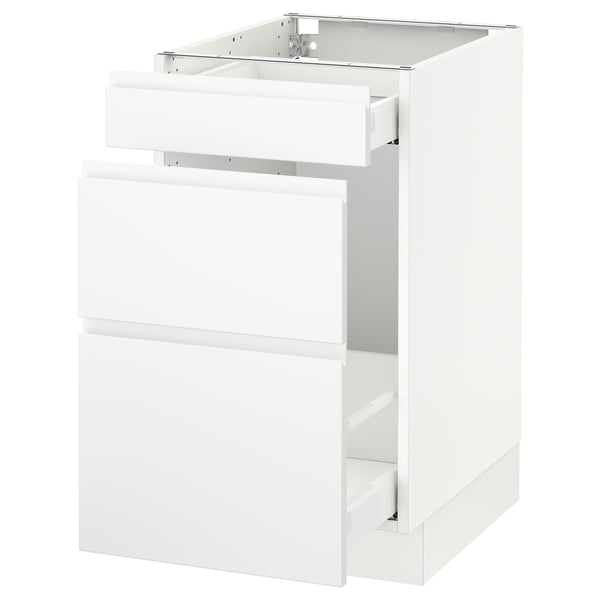 Modern white kitchen cabinet with minimalist design and smooth drawers.
