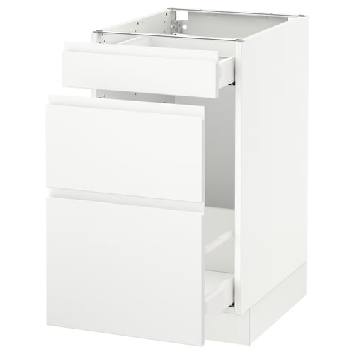 Modern white kitchen cabinet with minimalist design and smooth drawers.