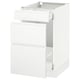 Modern white kitchen cabinet with minimalist design and smooth drawers.