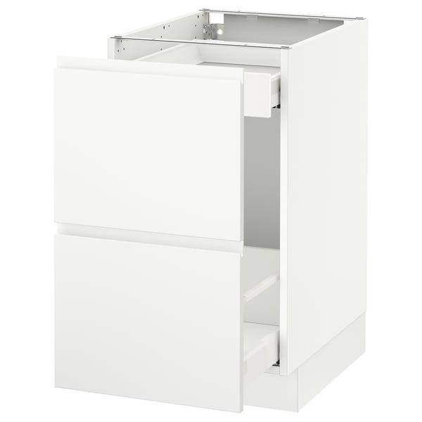 A white SEKTION kitchen cabinet with a modern design and smooth front, featuring integrated handles.