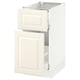 An off-white SEKTION kitchen cabinet with one open drawer, highlighting its smooth-running mechanism.