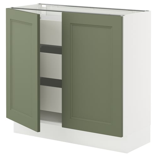 Green cabinet with white frame, 2 open doors, smooth wooden finish.