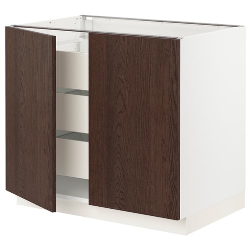 An open ikea SEKTION kitchen cabinet. It has dark brown sinarp doors with wooden edges, glass shelves, and a white frame.