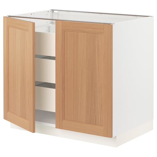 SEKTION kitchen cabinet in oak wood with white base, featuring two doors and three interior shelves.