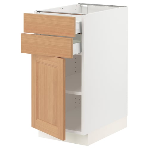 SEKTION kitchen cabinet in white with oak drawers and door. Showing open drawer and door with natural wood finish.