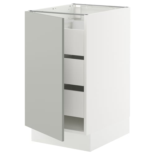 White SEKTION kitchen cabinet, tall, sleek, single door.