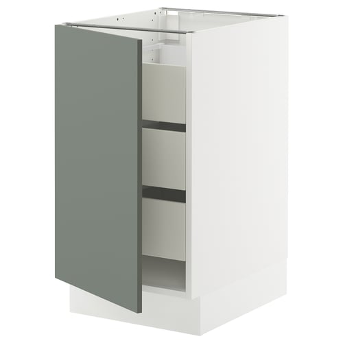 An open white kitchen cabinet with a grey-green door from the SEKTION collection.