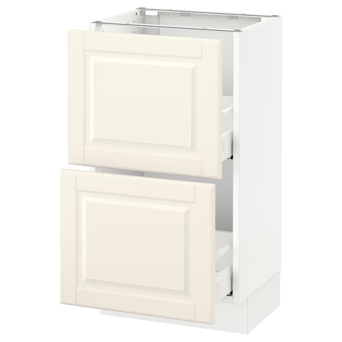 An off-white SEKTION kitchen cabinet with bevelled edges and two drawers, made of fiberboard and particleboard, featuring a traditional design.