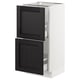 White SEKTION kitchen cabinet with black-stained doors and two bevelled drawers.