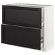 SEKTION kitchen unit in black with wooden drawers.