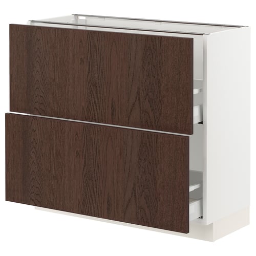 Dark wood cabinet with three shelves, white frame. Modern kitchen storage unit by IKEA.