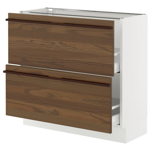 An ikea SEKTION kitchen cabinet with dark brown woodgrain drawers and a white base. It has two drawers with solid wooden handles.