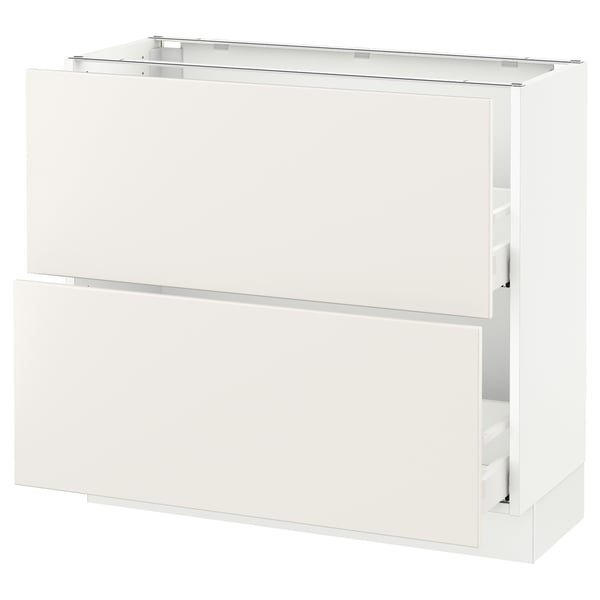 A white SEKTION kitchen cabinet with a smooth, modern design. It a drawer and a door.