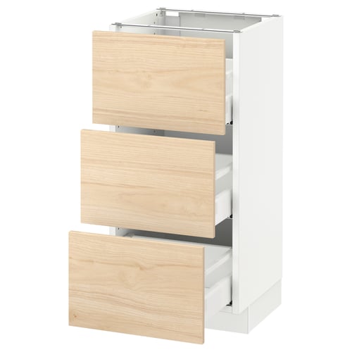 Ikea SEKTION light ash kitchen cabinet with three open drawers.