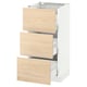 Ikea SEKTION light ash kitchen cabinet with three open drawers.