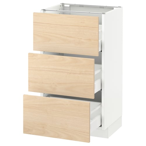 An ikea SEKTION kitchen cabinet with three light wood drawers. The cabinet is white and rectangular.