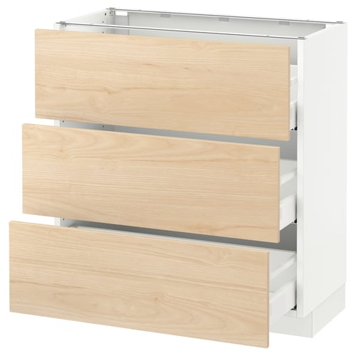 SEKTION kitchen unit with three light wood drawers and white frame.