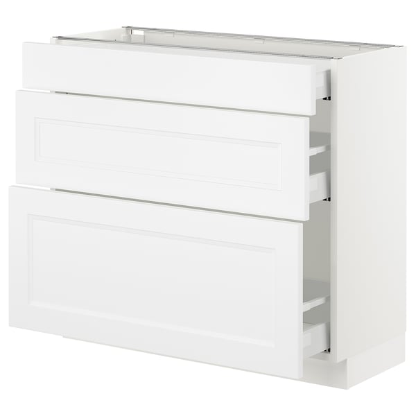 A white SEKTION kitchen cabinet with drawers and shelves. The design is sleek and modern.