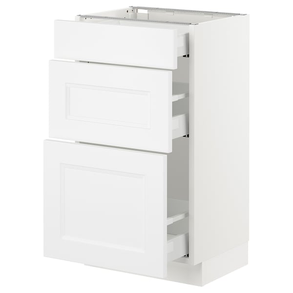 A white SEKTION kitchen cabinet with two drawers and open shelves. The design is modern and minimalistic.