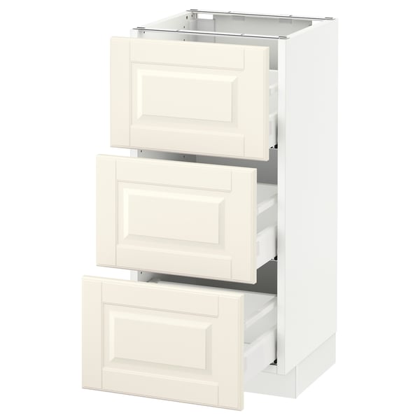 An off-white SEKTION kitchen cabinet with three open drawers, a smooth finish, and classic design.