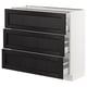 Modern black stained ash kitchen cabinet with bevelled edges in rectangular shape, three drawers, sleek and elegant design.
