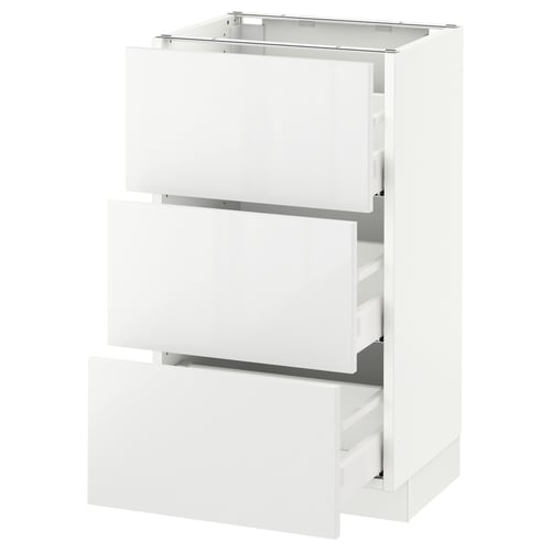 SEKTION white kitchen cabinet with three glossy drawers.