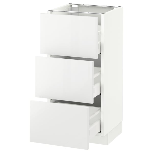 Ikea SEKTION white kitchen cabinet with glossy finish, stainless steel handles. Tall and slim, has three full-extension drawers.