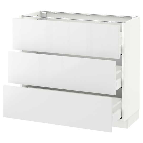 A white SEKTION kitchen cabinet with smooth, high-gloss drawer fronts. It has three drawers with a sleek, modern design.
