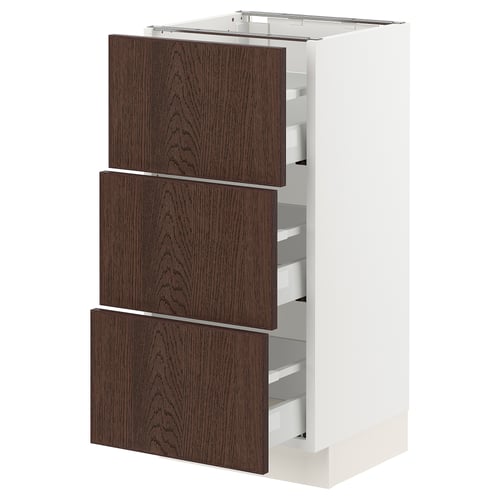 SEKTION kitchen cabinet with dark brown sinarp wood drawers and white frame.
