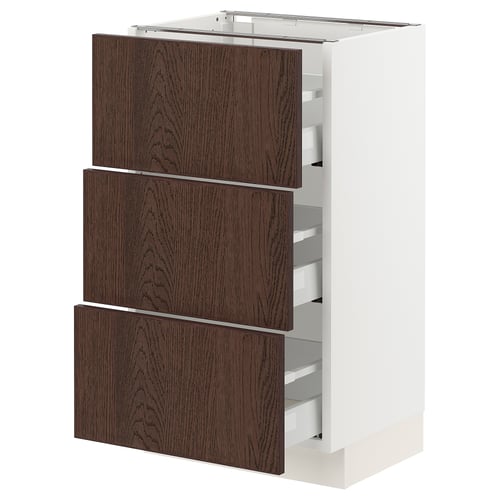 A modern kitchen cabinet with three dark brown wooden drawers, a white base, and metallic drawer handles.