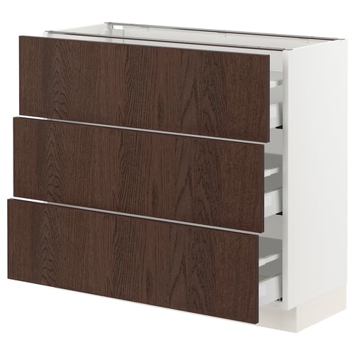 Dark wood drawers in white modern cabinet.