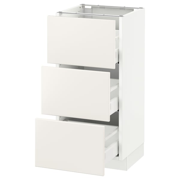 A white ikea SEKTION kitchen base cabinet with three full-extension drawers.