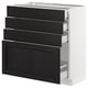 An ikea SEKTION kitchen cabinet with four black stained wooden drawers on a white frame.