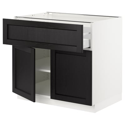 A SEKTION kitchen cabinet with black stained lerhyttan doors and drawers, featuring bevelled edges and adjustable shelves.