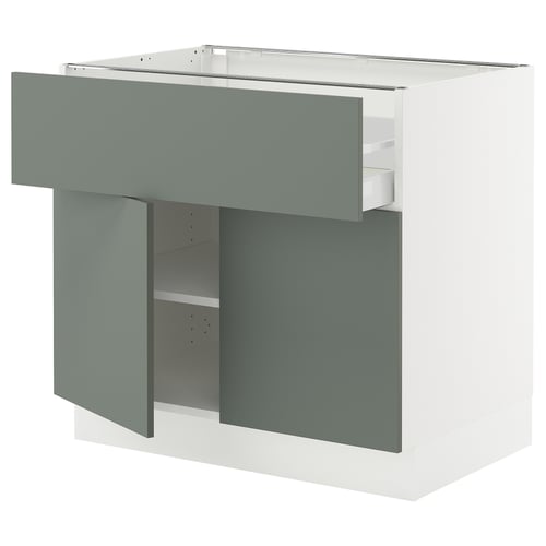SEKTION kitchen unit in grey-green with adjustable shelves and soft-closing drawer, modern design.