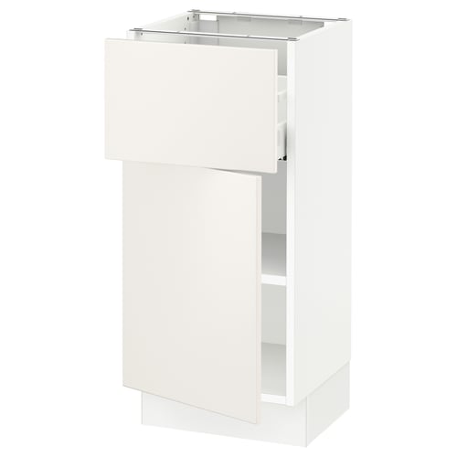 An ikea SEKTION white kitchen cabinet with a veddinge design, featuring smooth surfaces and clean lines.