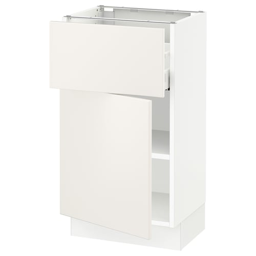 A white SEKTION kitchen cabinet with adjustable shelves and a door that can open left or right.