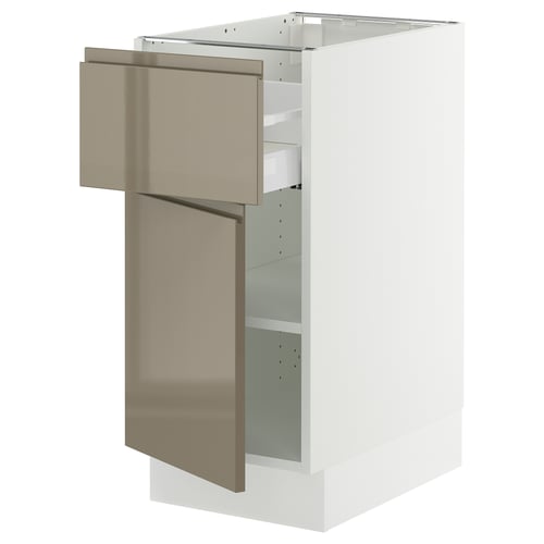 Modern white kitchen cabinet with large bronze drawer and door, sleek high-gloss finish.