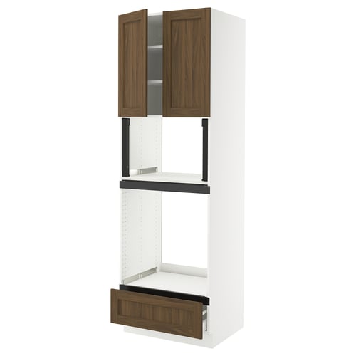 Walnut kitchen cabinet with white exterior and metallic hardware, featuring top doors, middle shelves, and bottom drawer.
