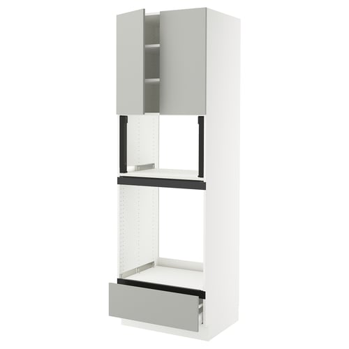 A modern white SEKTION kitchen cabinet with a light grey drawer. The cabinet is sleek and tall with a minimalist design.