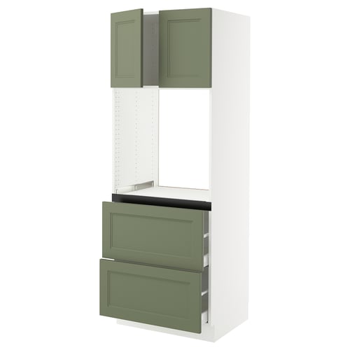 White and green kitchen cabinet with drawers and shelves.