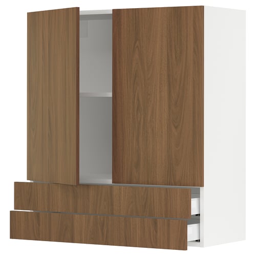 An ikea SEKTION kitchen cabinet with wooden panels in a walnut finish. It has two large open doors, two pull-out drawers, and an adjustable shelf.