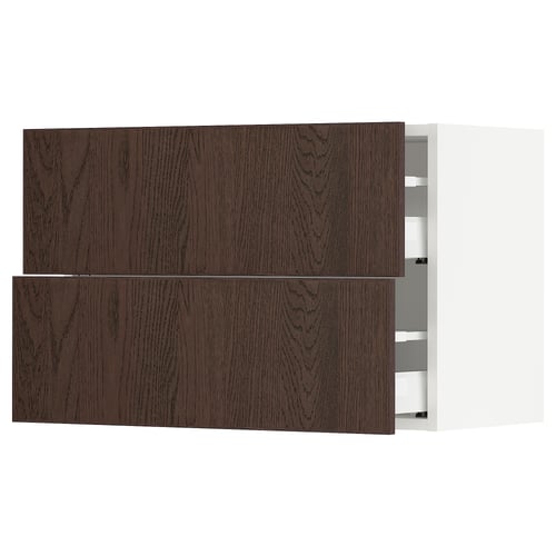 Dark brown wood kitchen cabinet with two open drawers.