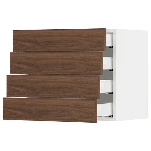 A modern kitchen cabinet with four wooden drawers. It walnut finish drawers with sleek handles.