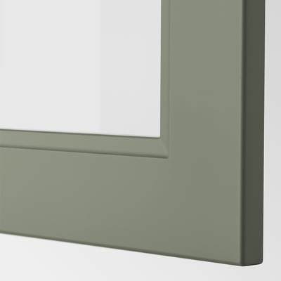 Green-framed glass panel, seamless join, high-quality finish.