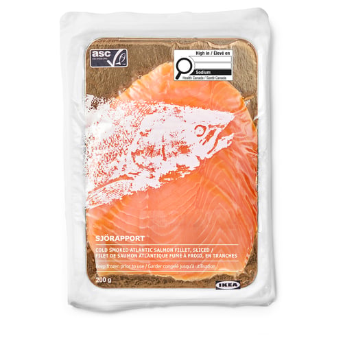 Clear plastic bag of SJÖRAPPORT cold smoked atlantic salmon fillets, sliced, showing orange-pink fish inside.